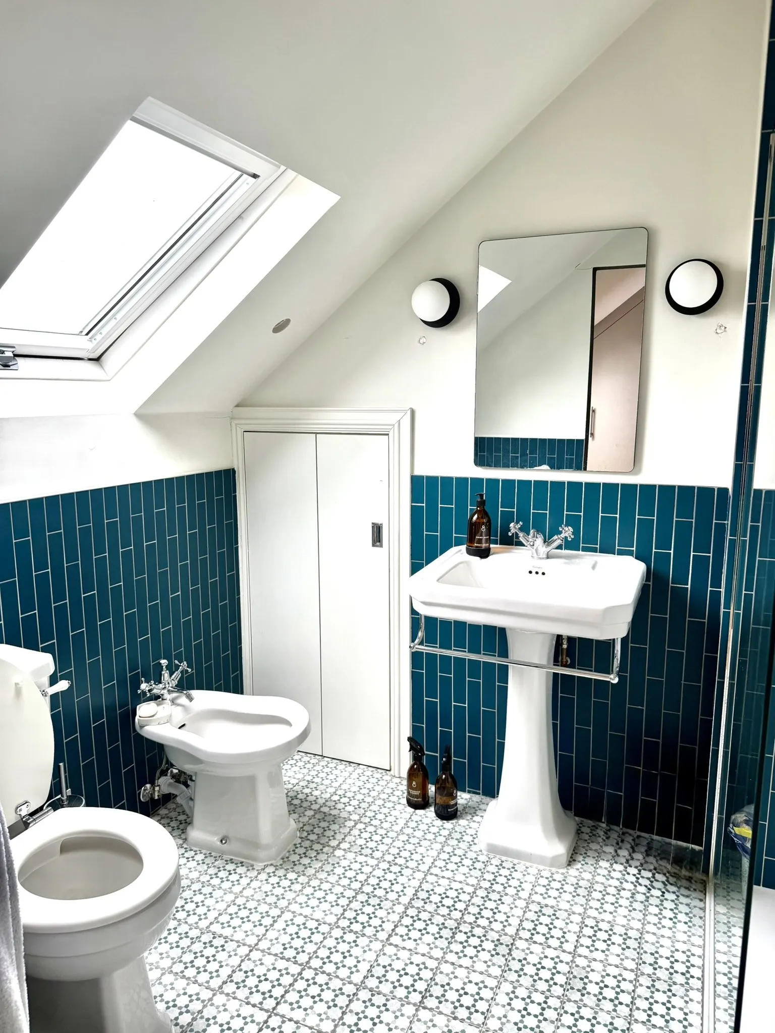 Finished loft bathroom with rooflight
